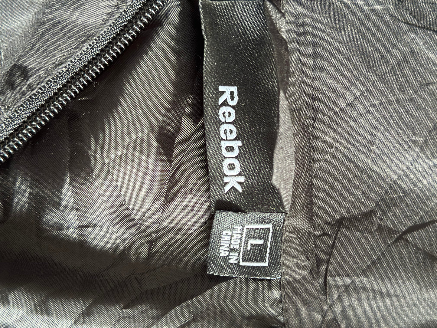 Jacket Reebok Quigley Catholic