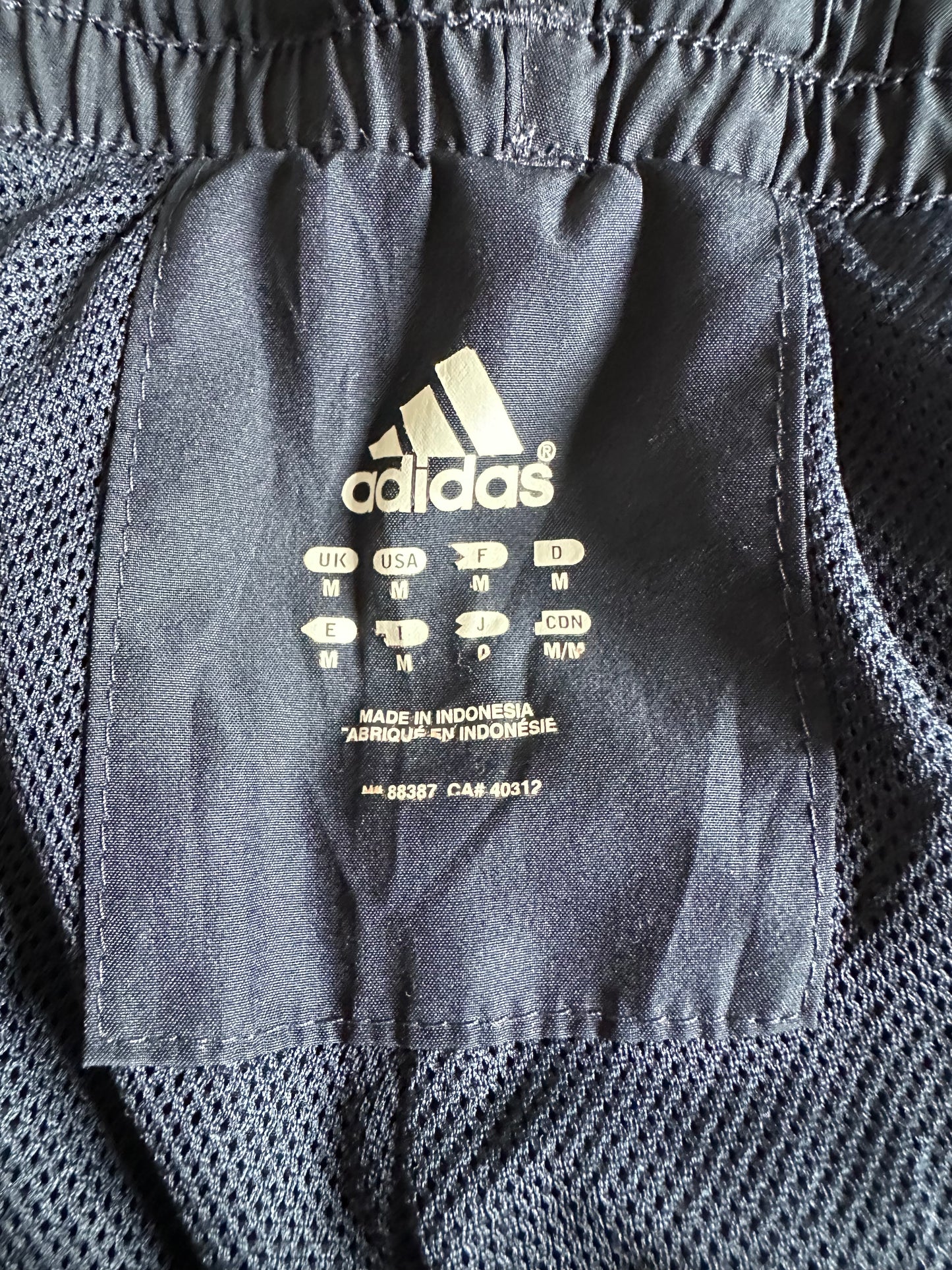 Blue Adidas Track Pants with Stripes