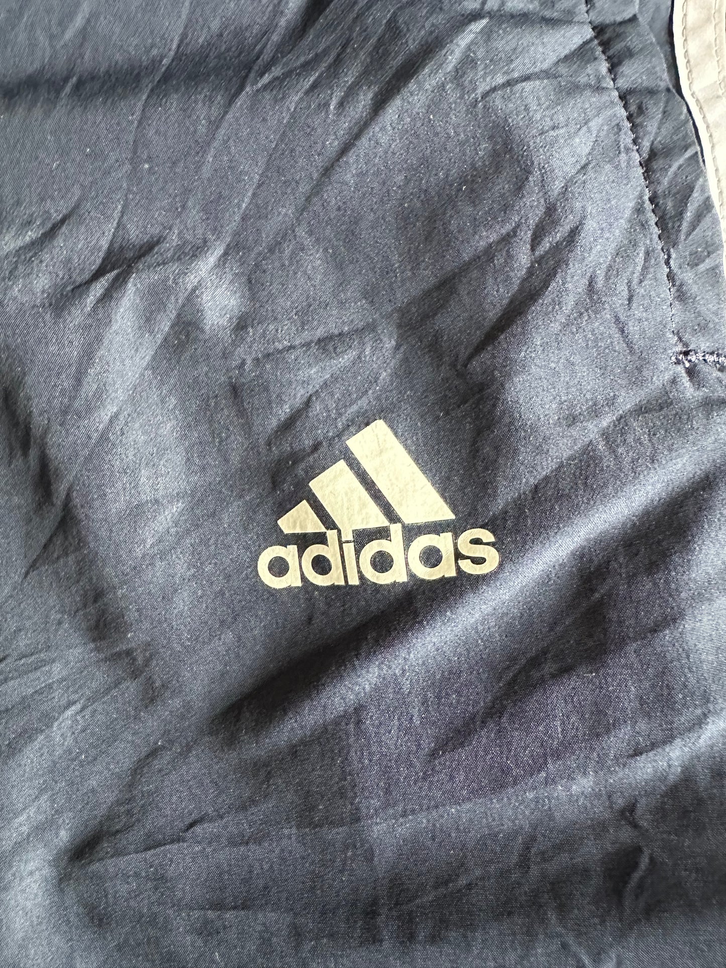 Blue Adidas Track Pants with Stripes